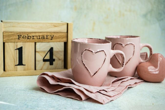 St. Valentine's Day card with two pink mugs with hearts