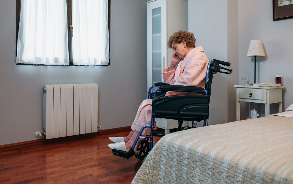 Woman in a wheelchair alone