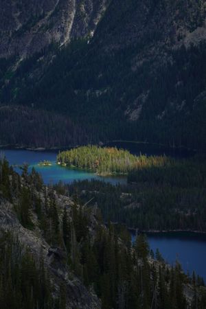 A ray of sunlight over an island in the mountains