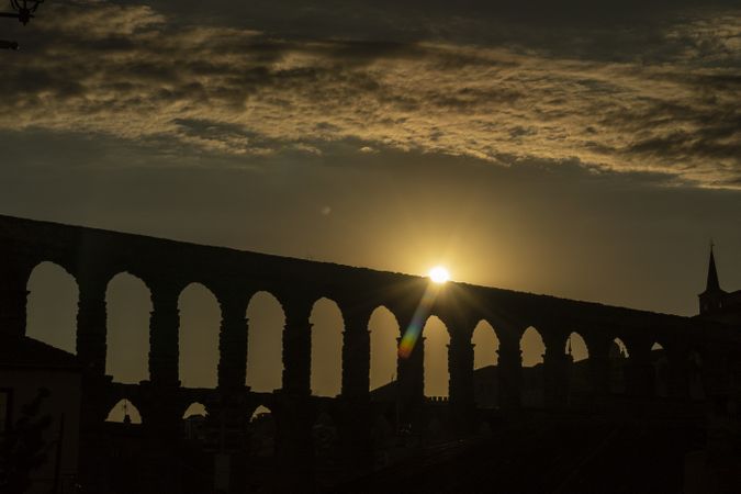 View of the famous Aqueduct of Segovia at dusk