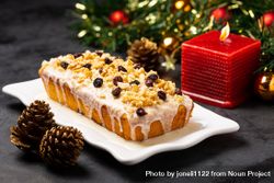 Fruit cake served on decorated Christmas table 4jolrb