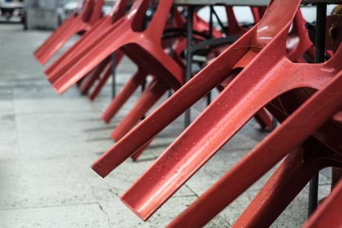 Ends of red chairs tilted up