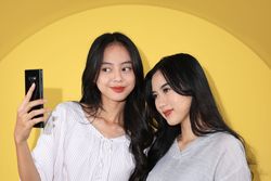 Two Generation Z Taking Selfie Together, Young Asian Bestie Girl Taking Photo using Mobile Phone.