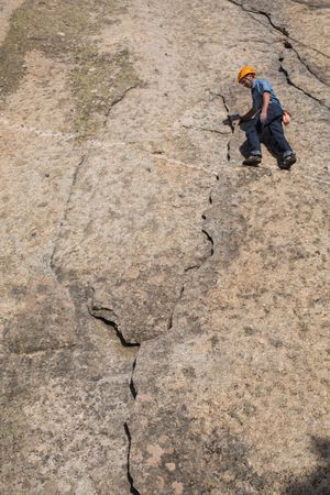 Free climber climbing in nature