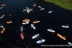 Aerial view of people riding on boat on water 4Ao9R0