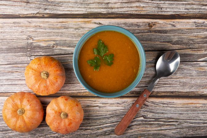 Delicious homemade pumpkin soup in bowl.