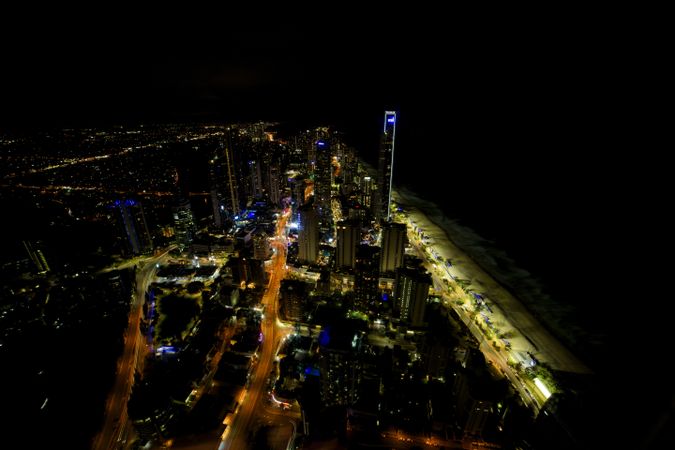 Modern city with skyscrapers at night