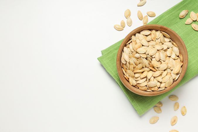 Cooking ingredients for fall season - pumpkin seeds, pumpkin