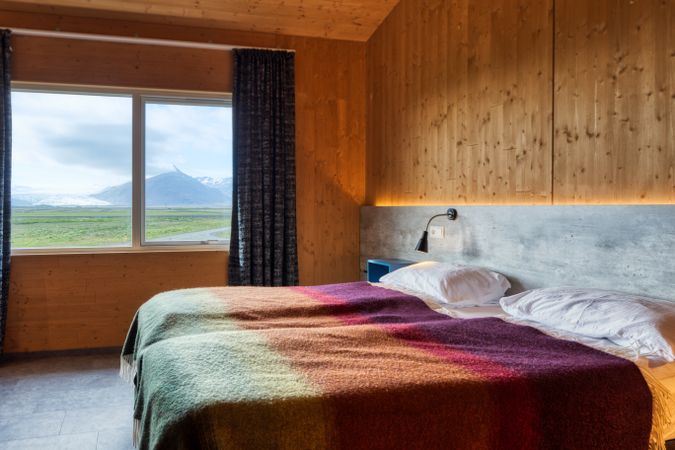 Double hotel room with rural view from window