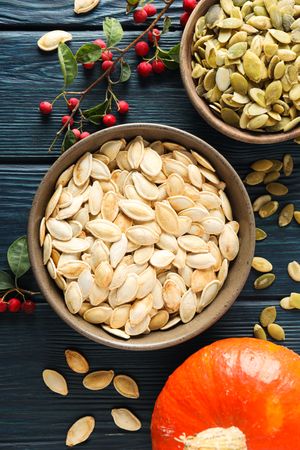Cooking ingredients for fall season - pumpkin seeds, pumpkin