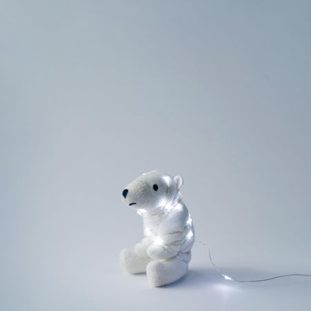 Polar bear toy with Christmas tree lights