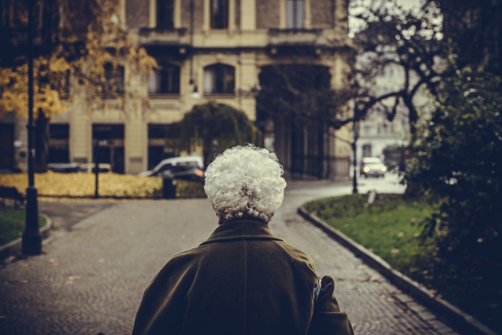 Person walking toward a building