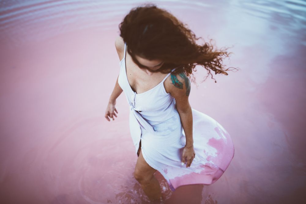 Woman enjoying sea breeze