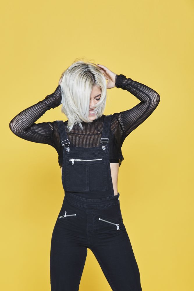 female in dark outfit
