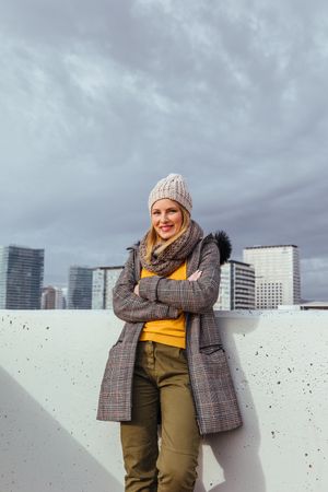 Portrait of blonde woman posing in the city