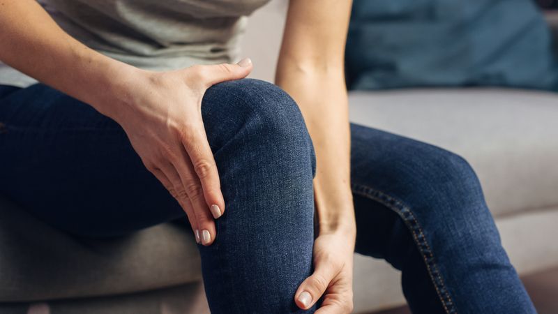 Human is in Severe Pain Due To Joint and Knee Problems. Close Up of a Person Experiencing Discomfort in a Result of Leg Trauma or Arthritis.