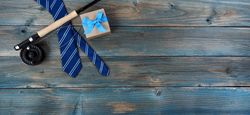 Fathers day gifts on faded blue wooden planks