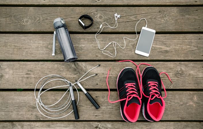 Set of sports equipment with sneakers