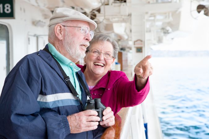 Mature Happy Couple On Deck Of Cruise Ship