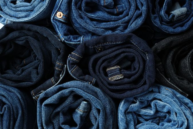 Concept of modern casual clothes - jeans, rolled jeans