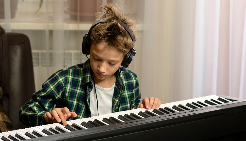 Young Pianist with Headphones
