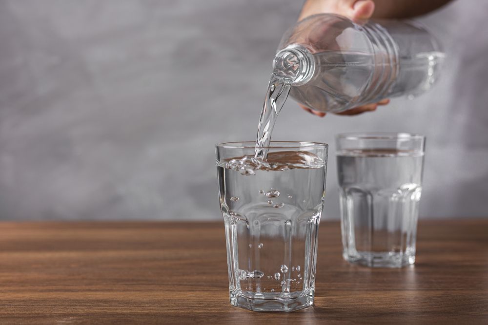 Glass of fresh water on the table.
