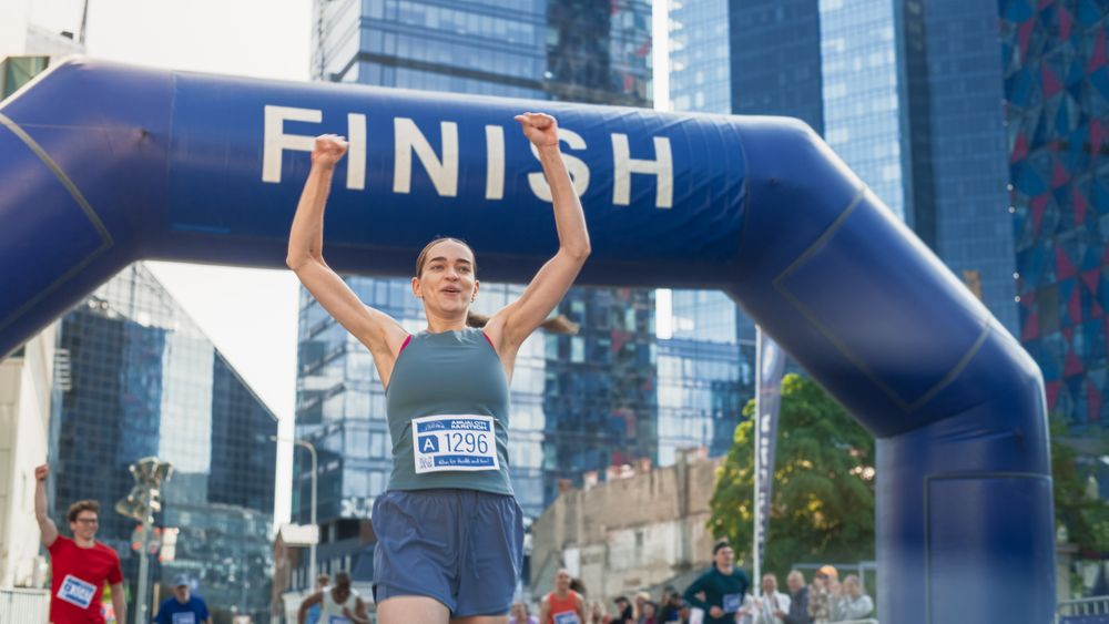Female Race Winner Achieving her Goal and Enjoys her Accomplishment
