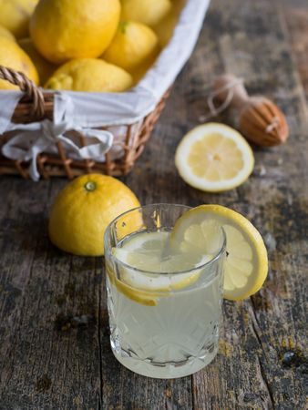 Glass cup with tasty lemonade