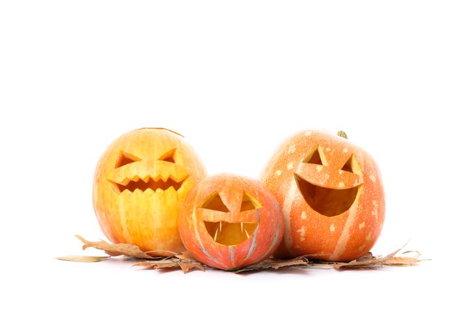 Halloween decorative pumpkins isolated on plain background