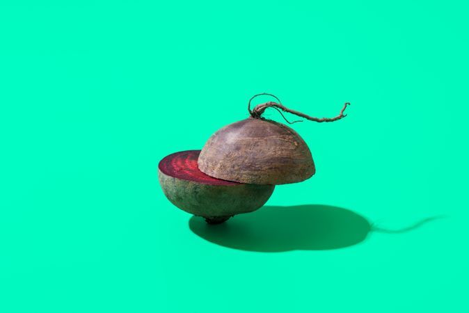 Red beetroot isolated on a green background