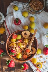 Bowl of homemade granola with berries