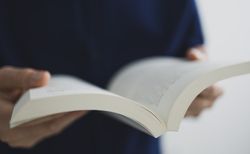 Man Reading Book Close-Up