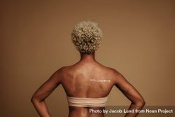 Rear view of woman standing with words Black lives matter written on back 4BR1E4