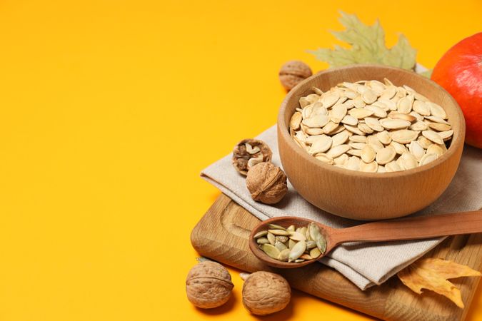 Concept of Autumn vibe food, Pumpkin, Pumpkin seeds, space for text