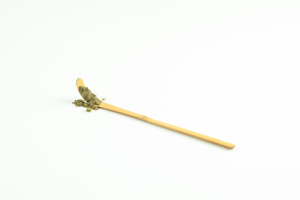 A Spoon of Matcha Powder on Greentea Matcha Spoon or Chasaku