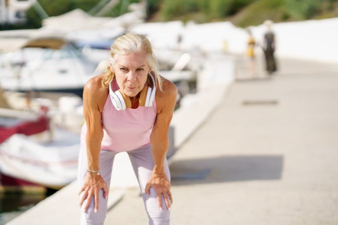 Older female taking a break during exercise