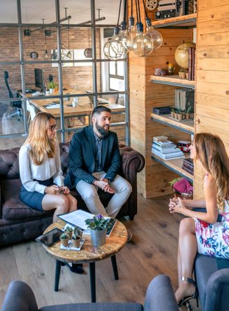 Businesspeople having an informal work meeting