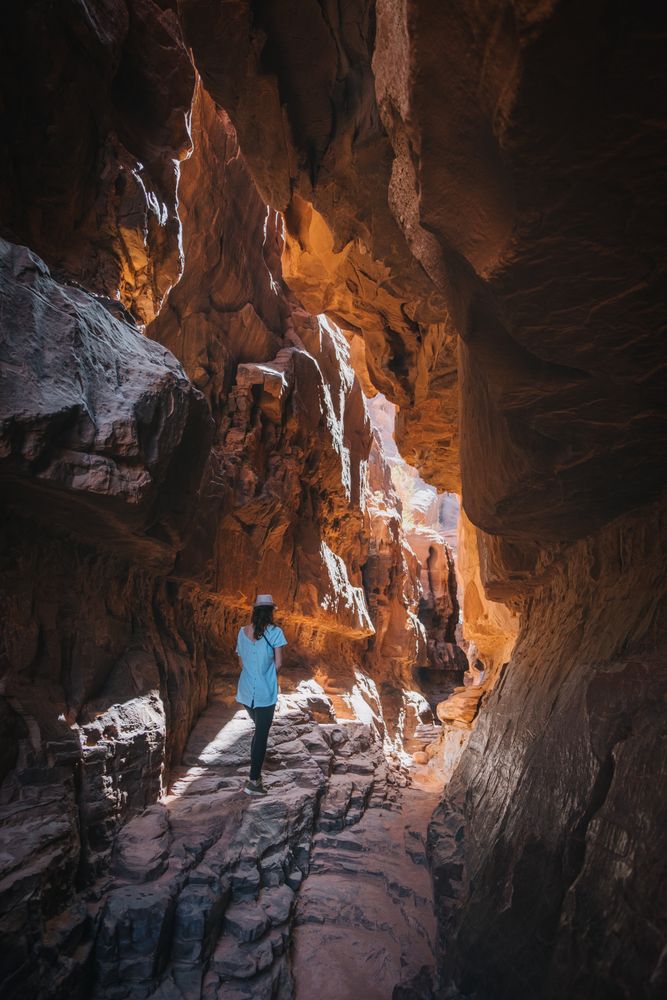 Anonymous traveler in rocky ravine