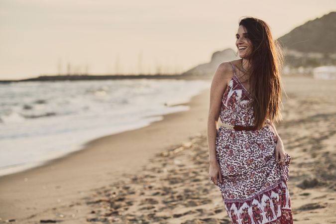 Woman with dress at the beach