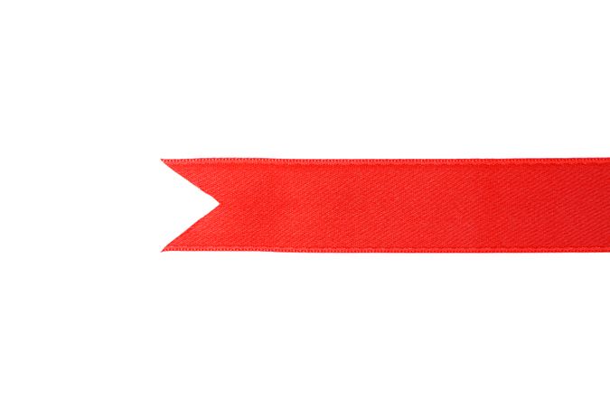 Red ribbon isolated on blank background. Gift concept