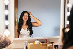 Happy bride after having her make up and hair done