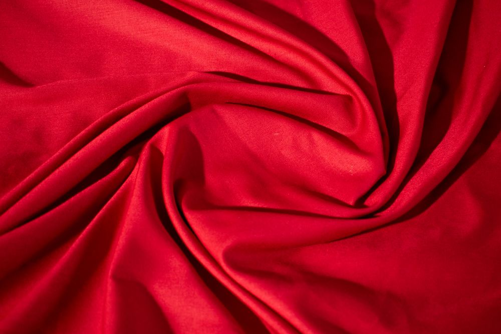 Silky Red Fabric Background Texture.
