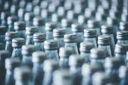 Rows of tops of bottles