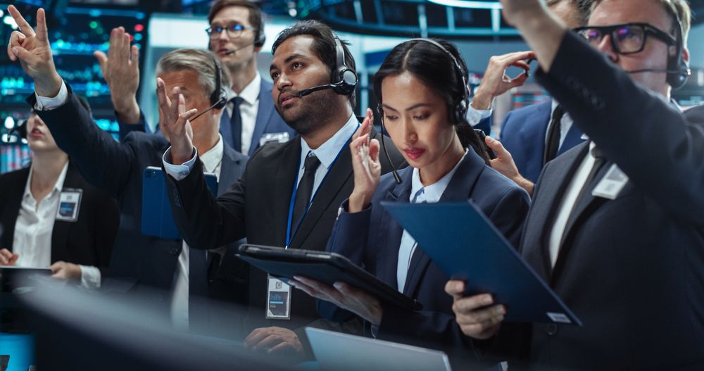 Portrait of Professional Traders Working on a Stock Exchange.