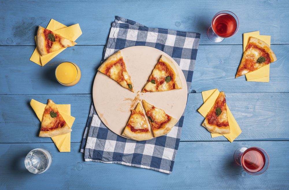 Summer dinner with margherita pizza and drinks