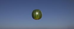 Floating watermelon in sky