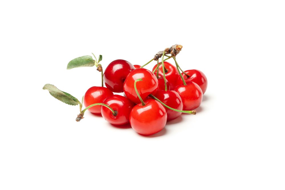 Fresh red cherry isolated on plain background