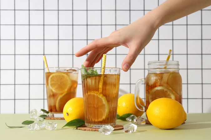 Cold tea with fresh oranges and mint leaves