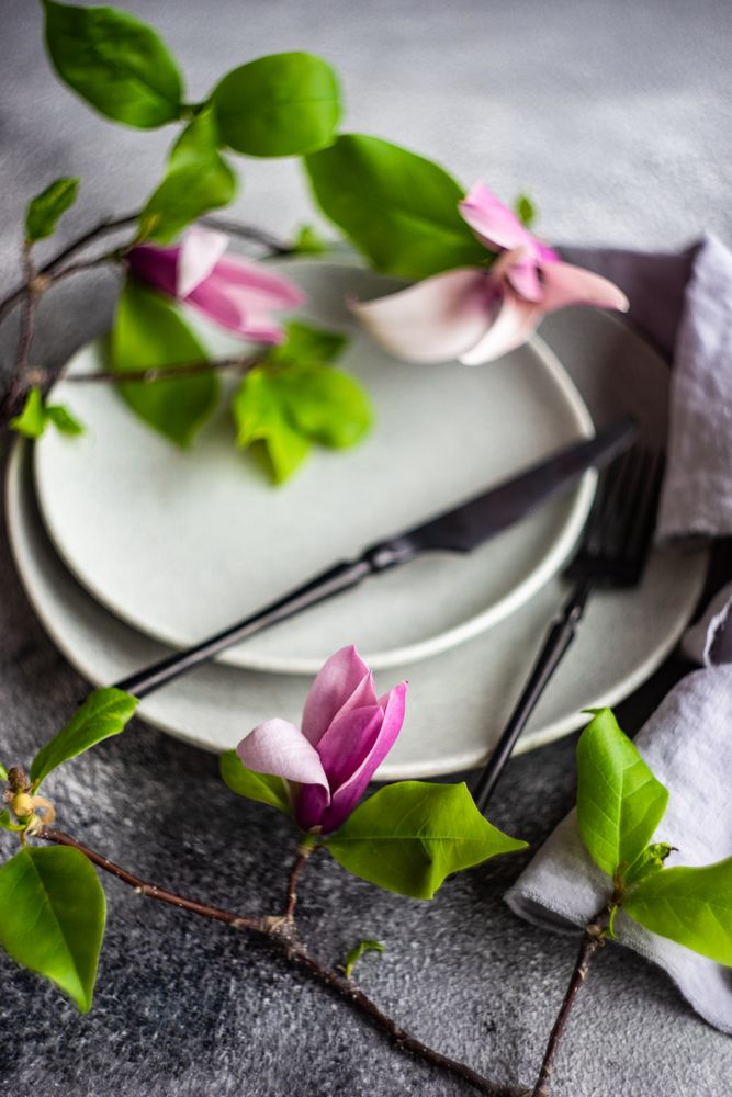 Magnolia branches on table setting