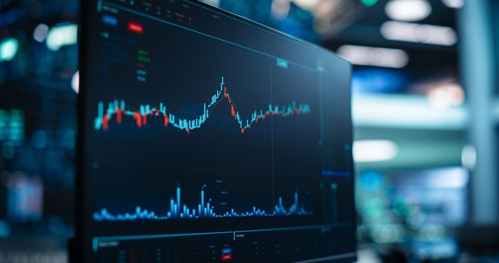 Computer Screen with Real-Time Stock Market Analytics, Candlestick Graphs and Financial Reports. Stock Exchange Software Template on a Monitor. Concept of a Stock Exchange, Economics and Business